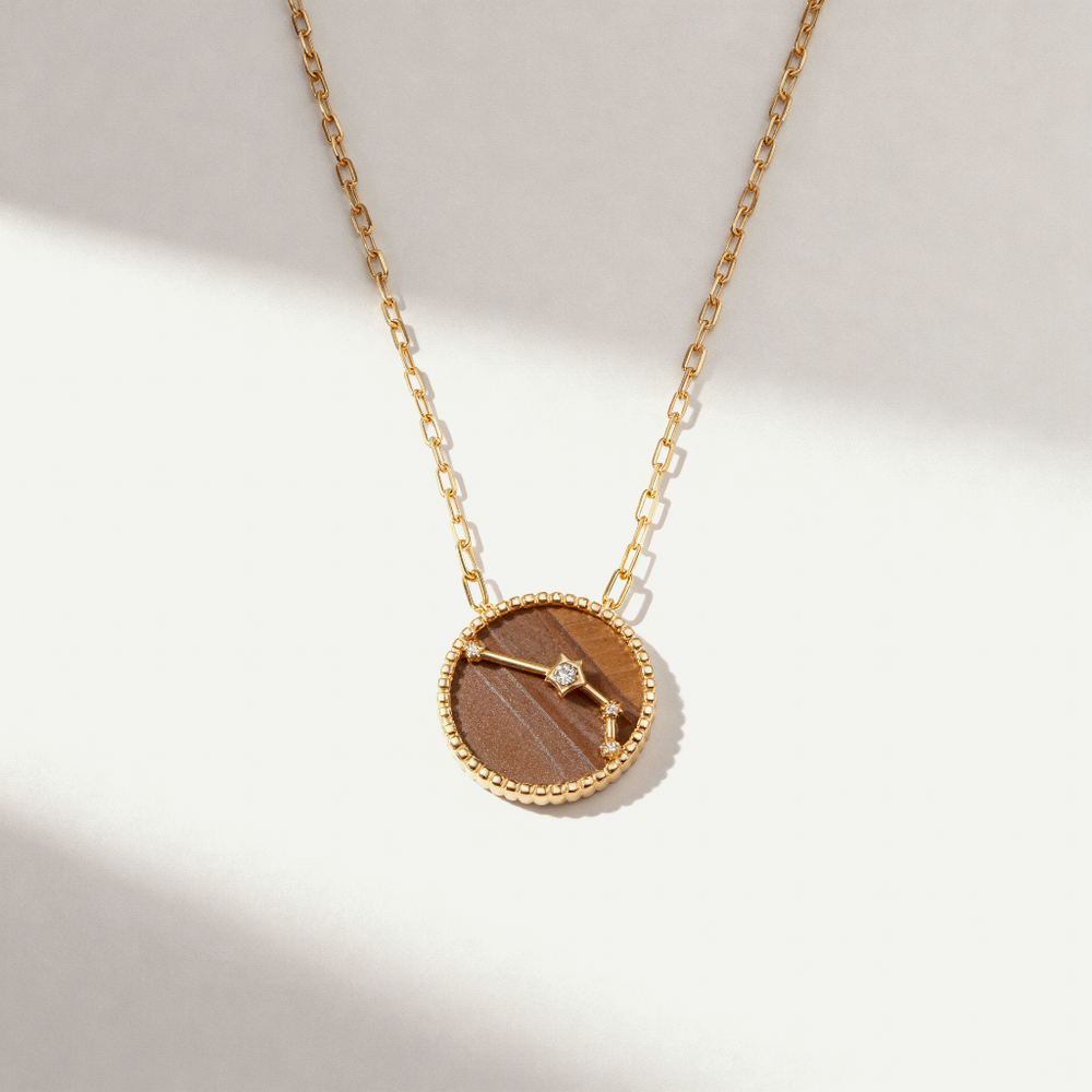 
                      
                        Colar Zodiac
                      
                    