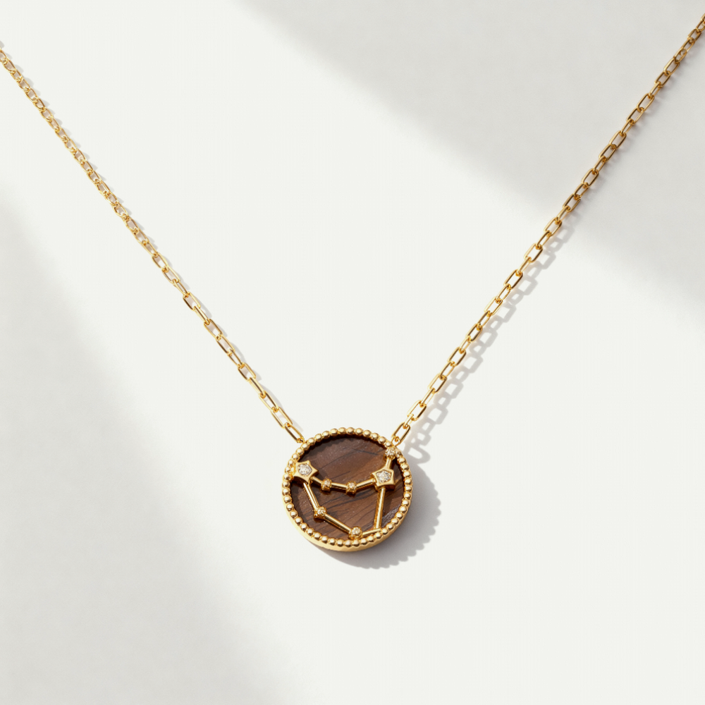
                      
                        Colar Zodiac
                      
                    